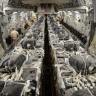 U.S. Army parachute riggers from the 11th Quartermaster Company assemble 40 container delivery system bundles of water onto a C-17 Globemaster III for a humanitarian airdrop over the area if Amirli, Iraq Aug. 30, 2014. [U.S. Air Force photo by Staff Sgt. Shawn Nicke, 8/30/14]